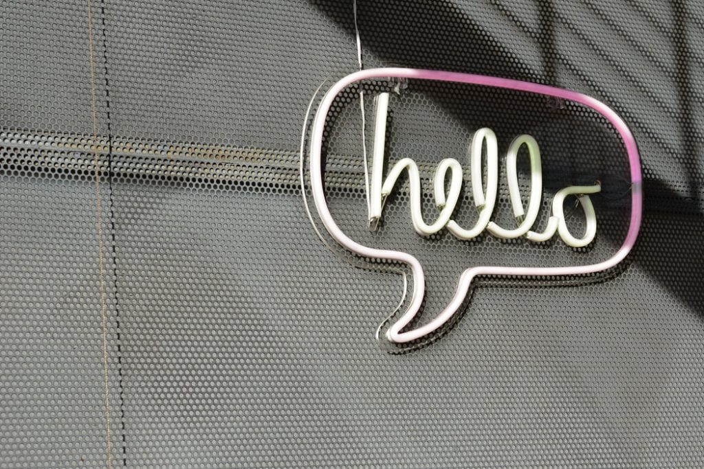 Neon sign "Hello" on a wall